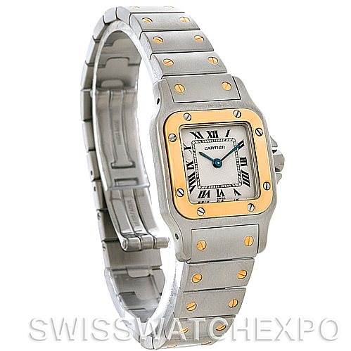 The image shows a Santos model watch by Cartier at a side angle, highlighting the bracelet, bezel, and face.