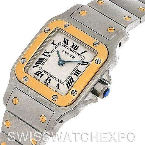 The image shows a close-up of the face and bracelet of a Cartier Santos W20012C4 Women
s Stainless Steel Silver Dial W20012C4 Women
s Stainless Steel Silver Dial watch, displaying the case, bezel, crown, and part of the bracelet.