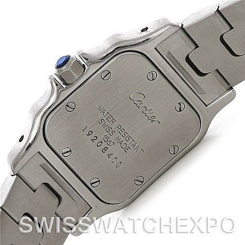 The image shows the backside and part of the bracelet of a Cartier Santos W20012C4 Women
s Stainless Steel Silver Dial W20012C4 Women
s Stainless Steel Silver Dial watch, highlighting its case back details and branding.