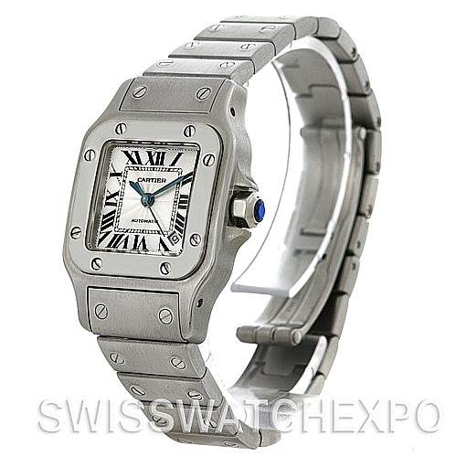 The image shows a Cartier Santos W20054D6 Women
s Stainless Steel Silver Dial W20054D6 Women
s Stainless Steel Silver Dial watch at a front-left angle, highlighting its square dial, metal bracelet, and blue crown.