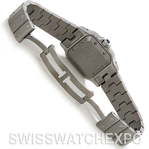 This image shows the back of the Cartier Santos W20054D6 Women
s Stainless Steel Silver Dial W20054D6 Women
s Stainless Steel Silver Dial watch, including parts of the metal bracelet and deployment clasp.
