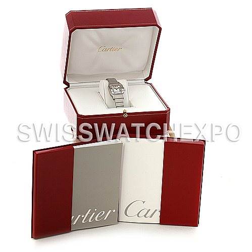 The image shows a Cartier Santos W20054D6 Women
s Stainless Steel Silver Dial W20054D6 Women
s Stainless Steel Silver Dial model watch inside a branded red box, with accompanying documents displayed in front.