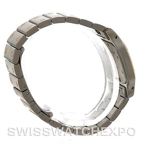 The image shows a side view of the bracelet and case back of a Santos model watch by Cartier.