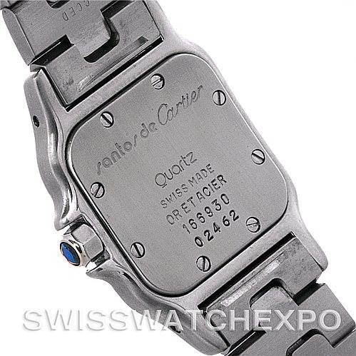 This image shows the back case and bracelet of a Cartier Santos W20012C4 Women
s Stainless Steel Silver Dial W20012C4 Women
s Stainless Steel Silver Dial Quartz watch, with visible screws, inscriptions, and a blue cabochon crown.