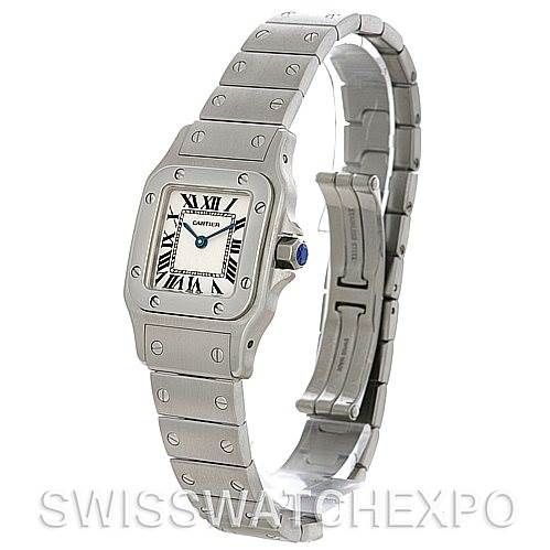The image shows a side and front angle of a Santos model by Cartier, highlighting its square face and metal bracelet.