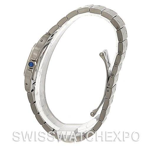 The image shows a side view of the Cartier Santos W20056D6 Women
s Stainless Steel Silver Dial W20056D6 Women
s Stainless Steel Silver Dial watch, highlighting its metal strap and blue cabochon crown.