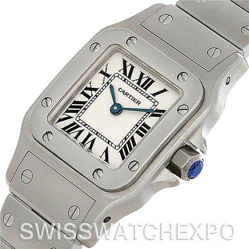 The image shows a close-up view of the Cartier Santos W20056D6 Women
s Stainless Steel Silver Dial W20056D6 Women
s Stainless Steel Silver Dial model, highlighting its face, bezel, and a portion of the bracelet.
