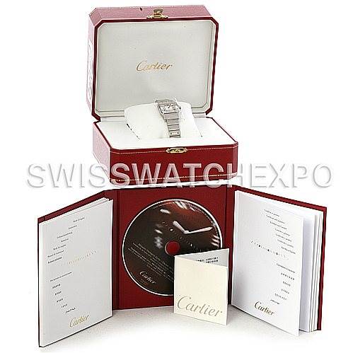 The image shows a Cartier Santos W20056D6 Women
s Stainless Steel Silver Dial W20056D6 Women
s Stainless Steel Silver Dial watch, its box, a CD, and booklets from a front angle.