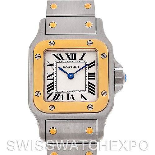 The image shows a front view of the dial, bezel, and part of the bracelet of a Santos model by Cartier.