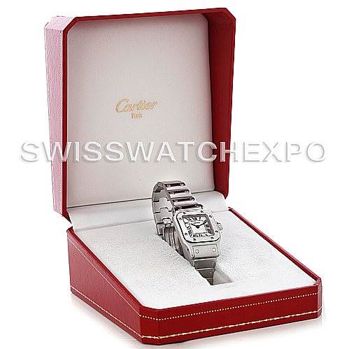 The image shows a Cartier Santos W20056D6 Women
s Stainless Steel Silver Dial W20056D6 Women
s Stainless Steel Silver Dial watch, with a metal band, displayed at a front angle inside a red Cartier box.