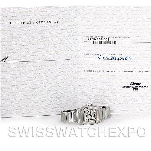 The image shows a Santos model Cartier watch lying flat with its band extended, accompanied by its certificate of Best Quality
ity.