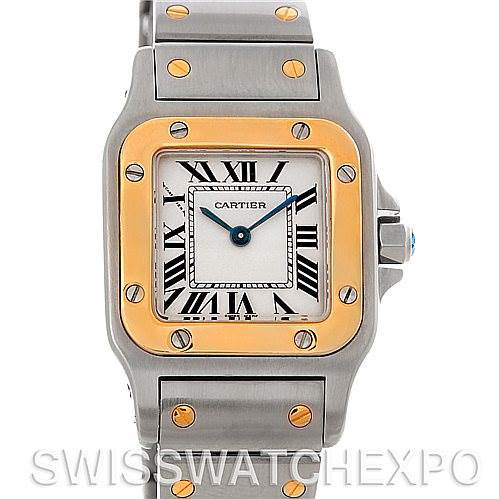 The image shows a front view of a Cartier Santos watch, highlighting its face, bezel, and bracelet with gold screws.