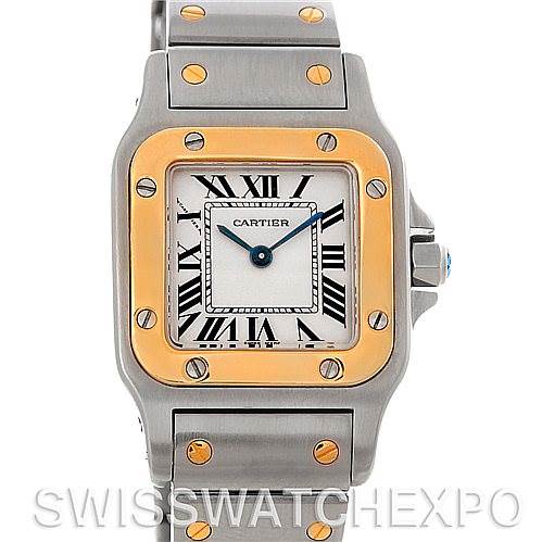 The image shows a front view of a Cartier Santos W20012C4 Women
s Stainless Steel Silver Dial W20012C4 Women
s Stainless Steel Silver Dial watch, highlighting its face, bezel, and bracelet with gold screws.