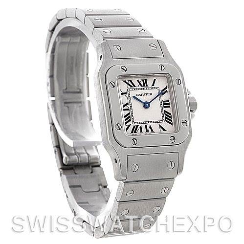 The Cartier Santos W20056D6 Women
s Stainless Steel Silver Dial W20056D6 Women
s Stainless Steel Silver Dial watch is shown at an oblique angle, highlighting the rectangular bezel, bracelet, and clasp.