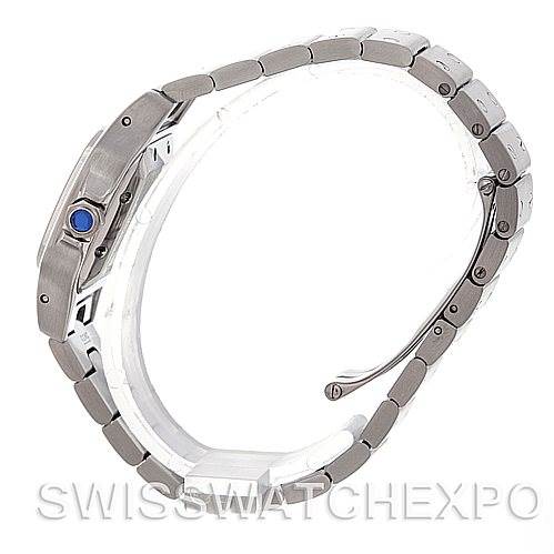 The image shows a side view of the Cartier Santos W20054D6 Women
s Stainless Steel Silver Dial W20054D6 Women
s Stainless Steel Silver Dial watch, highlighting the band and the sapphire crown.