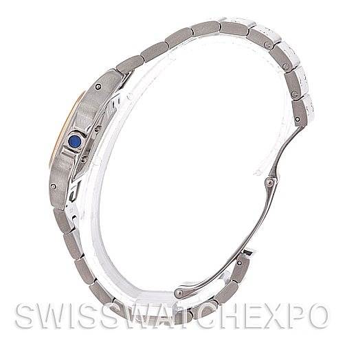 The image shows a side view of the Cartier Santos W20057C4 Women's Stainless Steel Silver Dial W20057C4 Women's Stainless Steel Silver Dial watch, focusing on the bracelet and the crown with a blue stone.