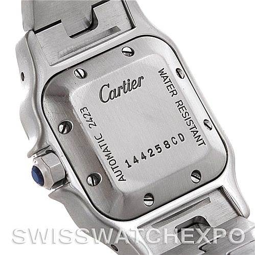 The image shows the back case of a Santos model watch by Cartier at a slight angle.