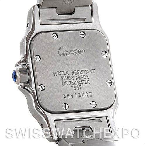 The image shows the case back of a Cartier Santos W20012C4 Women
s Stainless Steel Silver Dial W20012C4 Women
s Stainless Steel Silver Dial watch, displaying the brand name, water resistance, and other specifications.