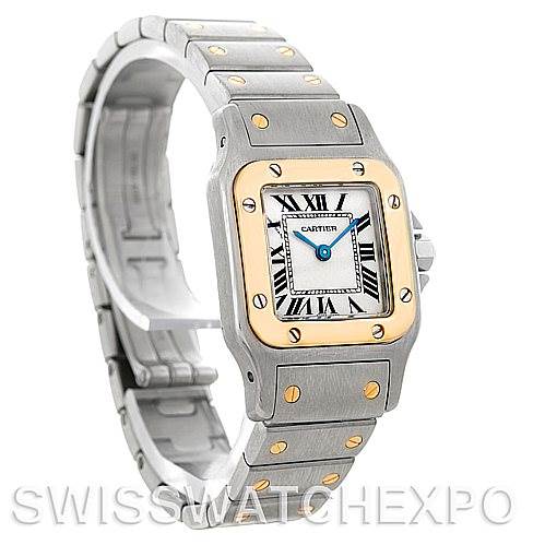 The Cartier Santos W20012C4 Women
s Stainless Steel Silver Dial W20012C4 Women
s Stainless Steel Silver Dial watch is shown at an angled side view, displaying its bracelet, square dial, and bezel.