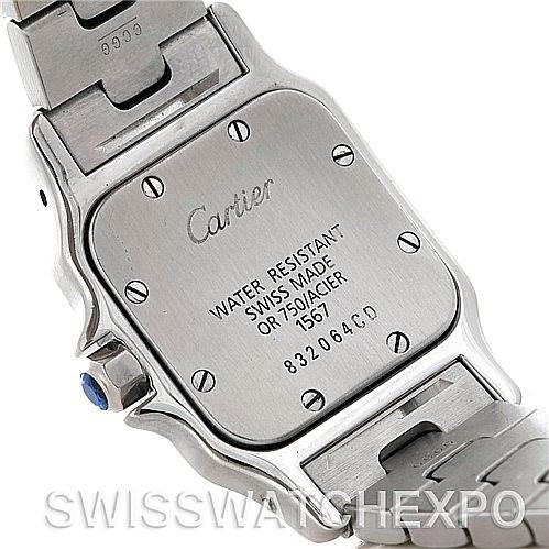 The image shows the backside of a Cartier Santos W20012C4 Women
s Stainless Steel Silver Dial W20012C4 Women
s Stainless Steel Silver Dial watch, including the case back with engraved details and part of the bracelet.