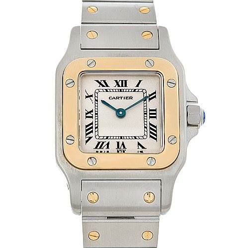 The image shows a frontal view of a Cartier Santos W20012C4 Women
s Stainless Steel Silver Dial W20012C4 Women
s Stainless Steel Silver Dial watch, highlighting its square face, Roman numeral dial, and metal bracelet.
