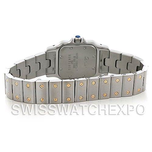 The image shows the back of the Cartier Santos W20012C4 Women
s Stainless Steel Silver Dial W20012C4 Women
s Stainless Steel Silver Dial watch, highlighting the case back and metal bracelet with gold screws.