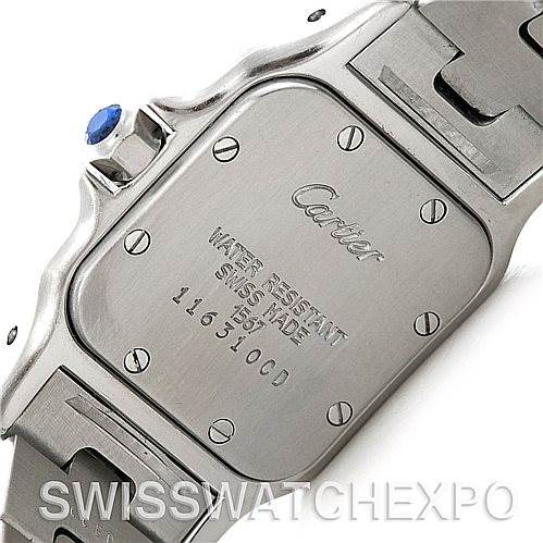 This is an image of the back of a Cartier Santos W20012C4 Women
s Stainless Steel Silver Dial W20012C4 Women
s Stainless Steel Silver Dial model watch, showing the case back with the brand name, water resistance information, and serial number.