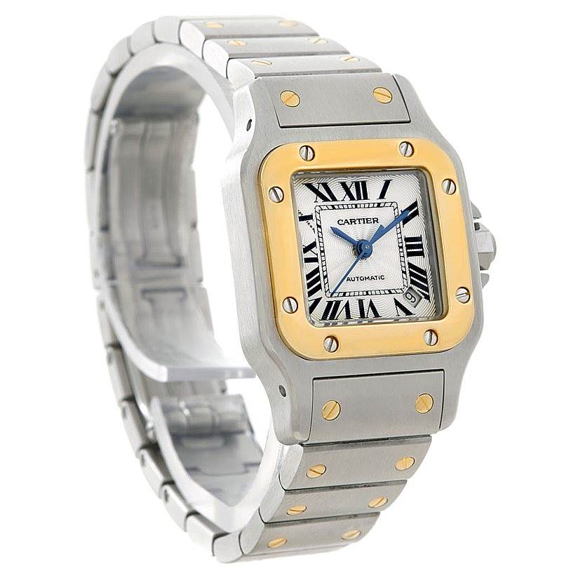 The image shows a Cartier Santos W20045C4 Women
s Stainless Steel Silver Dial W20045C4 Women
s Stainless Steel Silver Dial watch at a three-quarter angle, highlighting the dial, bezel, bracelet, and screws.