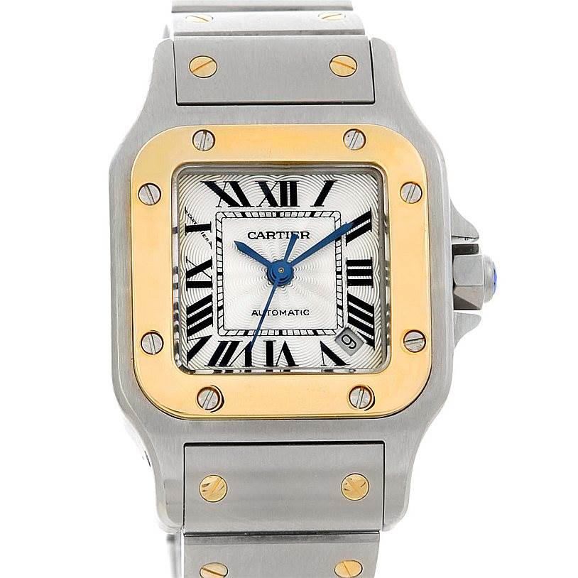 The image shows a front view of a Cartier Santos W20045C4 Women
s Stainless Steel Silver Dial W20045C4 Women
s Stainless Steel Silver Dial watch, displaying its face, bezel, and part of the bracelet.