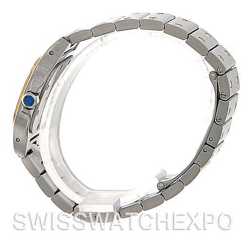 The image shows a side view of a Cartier Santos W20012C4 Women's Stainless Steel Silver Dial W20012C4 Women's Stainless Steel Silver Dial watch, highlighting its metal bracelet and crown with a blue cabochon.