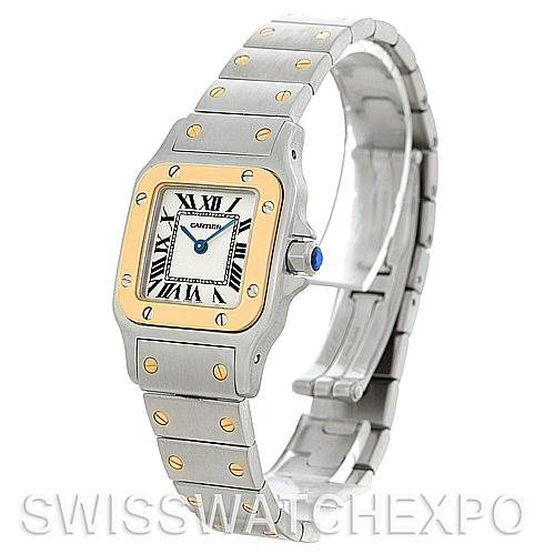 The image shows a Cartier Santos W20012C4 Women
s Stainless Steel Silver Dial W20012C4 Women
s Stainless Steel Silver Dial watch from an angled side view, featuring the face, bezel, and bracelet.