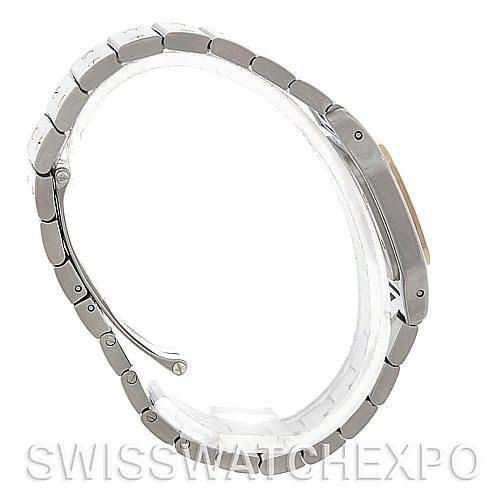 The image shows the side view of the bracelet and case of a Santos model watch by Cartier, highlighting its metallic links.