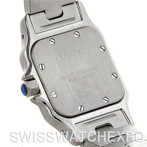 The image shows the case back of a Cartier Santos W20012C4 Women
s Stainless Steel Silver Dial W20012C4 Women
s Stainless Steel Silver Dial watch, highlighting the brushed metal finish and engraved details.