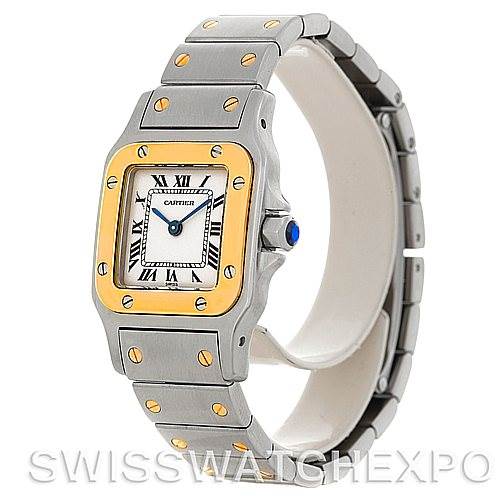 The image shows a side view of a Cartier Santos W20012C4 Women
s Stainless Steel Silver Dial W20012C4 Women
s Stainless Steel Silver Dial watch, highlighting its two-tone bezel, bracelet, and crown.