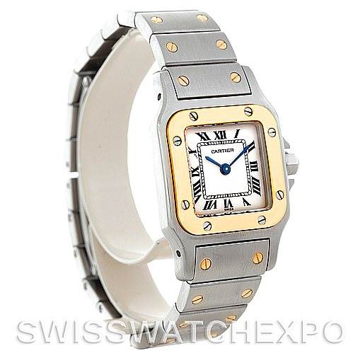 The image shows a front-angle view of a Cartier Santos W20012C4 Women
s Stainless Steel Silver Dial W20012C4 Women
s Stainless Steel Silver Dial watch, highlighting the face, bezel, and metal bracelet with gold screws.