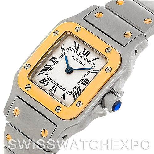 This image features a close-up angled view of a Cartier Santos W20012C4 Women
s Stainless Steel Silver Dial W20012C4 Women
s Stainless Steel Silver Dial watch, highlighting the dial, bezel, and part of the bracelet.