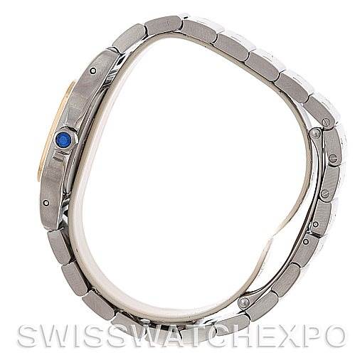 The image shows a Cartier Santos W20012C4 Women
s Stainless Steel Silver Dial W20012C4 Women
s Stainless Steel Silver Dial watch from a side angle, highlighting the bracelet and crown with a blue accent.