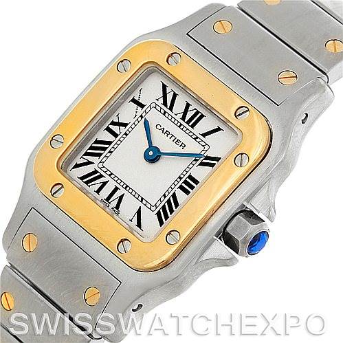 This image shows the face and bracelet of a Cartier Santos W20012C4 Women
s Stainless Steel Silver Dial W20012C4 Women
s Stainless Steel Silver Dial watch at a slight angle, highlighting the bezel and crown.