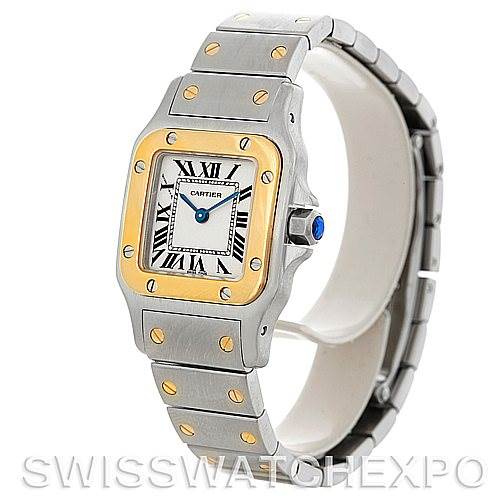 The image shows a Cartier Santos W20012C4 Women
s Stainless Steel Silver Dial W20012C4 Women
s Stainless Steel Silver Dial watch from a left-side angle, highlighting its face, bezel, and bracelet.