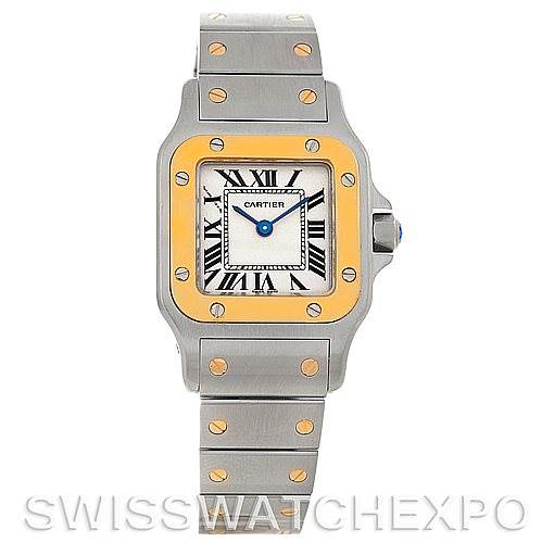 The image shows a front view of a Cartier Santos W20012C4 Women
s Stainless Steel Silver Dial W20012C4 Women
s Stainless Steel Silver Dial watch with a metal bracelet and a square dial with Roman numerals.