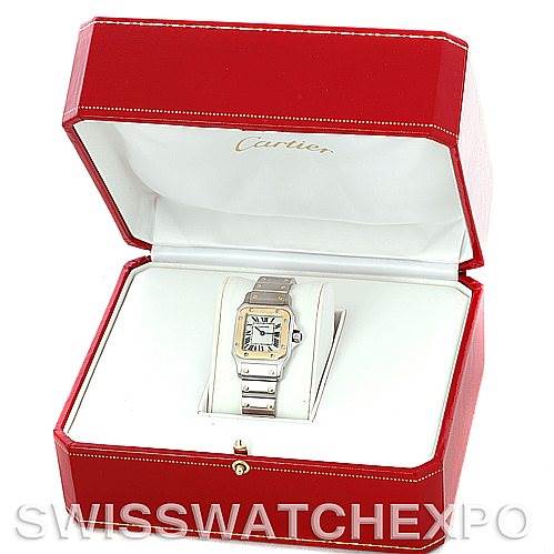 The image shows a Cartier Santos W20012C4 Women
s Stainless Steel Silver Dial W20012C4 Women
s Stainless Steel Silver Dial watch in a red Cartier box, viewed from the front.