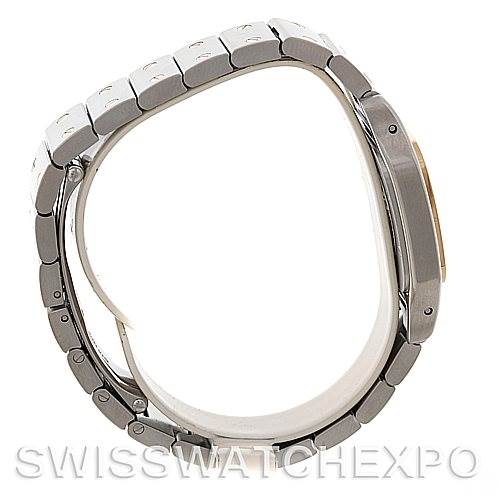 This image shows the side view of a Cartier Santos W20012C4 Women
s Stainless Steel Silver Dial W20012C4 Women
s Stainless Steel Silver Dial watch, displaying its bracelet and case profile.