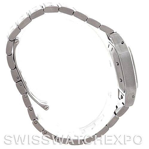 The image shows the side view of a Cartier Santos W20054D6 Women
s Stainless Steel Silver Dial W20054D6 Women
s Stainless Steel Silver Dial watch, highlighting its case and metal bracelet.