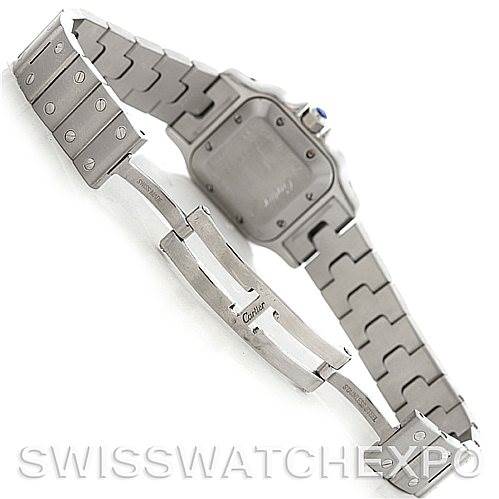 The image shows the back and partially opened bracelet of the Santos model by Cartier.