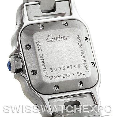 The image shows the back case of a Cartier Santos W20054D6 Women
s Stainless Steel Silver Dial W20054D6 Women
s Stainless Steel Silver Dial watch, displaying its water resistance, automatic movement, and stainless steel details.