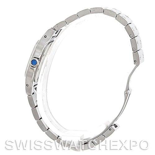 Side view of the Santos model by Cartier, showcasing the bracelet and blue cabochon crown.