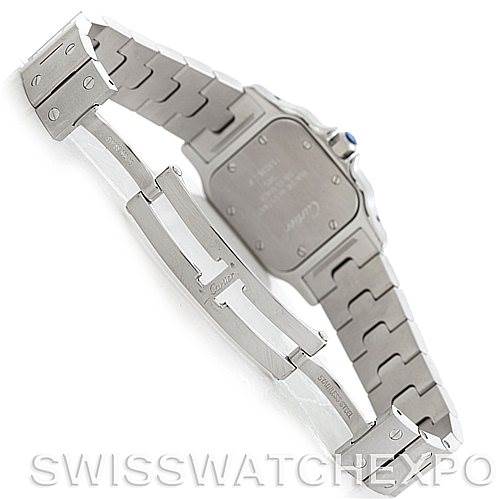 The image shows the back and partially open bracelet clasp of a Santos model watch by Cartier.