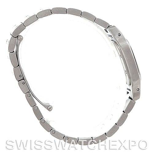 The image shows a Cartier Santos W20056D6 Women
s Stainless Steel Silver Dial W20056D6 Women
s Stainless Steel Silver Dial model watch from the side, highlighting its bracelet and profile of the case.