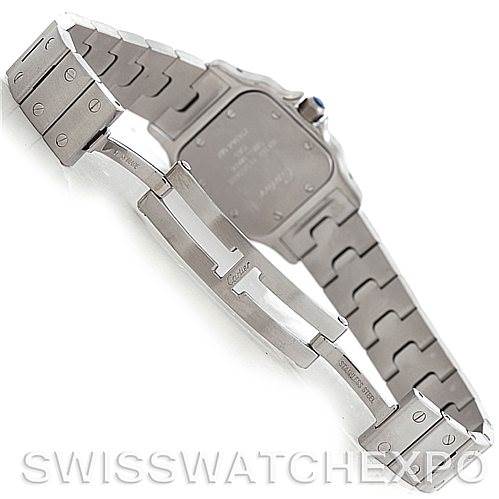 The image shows the back of a Cartier Santos W20056D6 Women
s Stainless Steel Silver Dial W20056D6 Women
s Stainless Steel Silver Dial model watch and its open clasp mechanism.