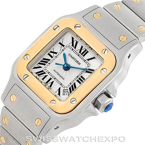 This image shows a close-up angle of the Cartier Santos 2423 Women's Stainless Steel Silver Dial 2423 Women's Stainless Steel Silver Dial watch, highlighting the bezel, dial with Roman numerals, and part of the bracelet.